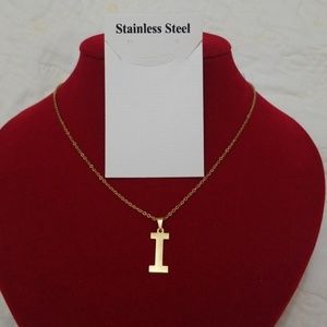 I gold pendant